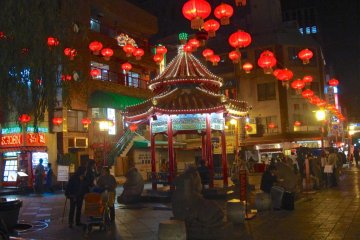 People hang out near the Nankinmachi Square, Motomachi
