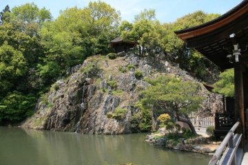 Water cascades down the rocks below the Rokkakudo