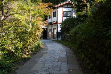 Closer to the spring, the path becomes paved again