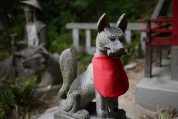 The "Inari" Jinja at the back features foxes and red tori gates