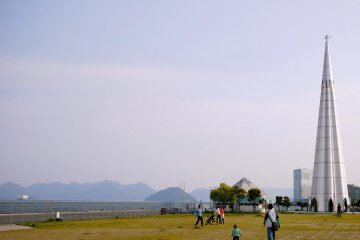 Large, open play area with a view of the islands around the port