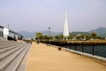 View of the tower from the waterfront eatery and shopping areas.