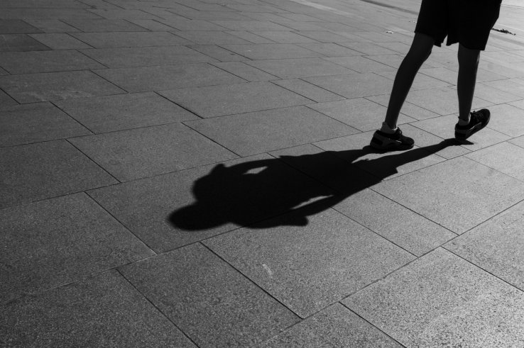On any street, you will see shadows when the sunlight is harsh, so wait for the right moment and take your dramatic picture