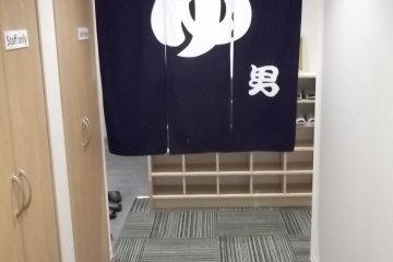 Entrance to the mens' bathroom