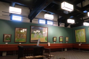 An art exhibition that features a local painter. However, I was more interested in the huge beams and roof structure
