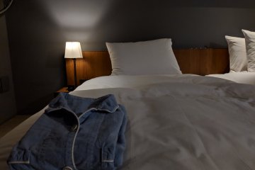 Comfy beds, complete with pajamas!
