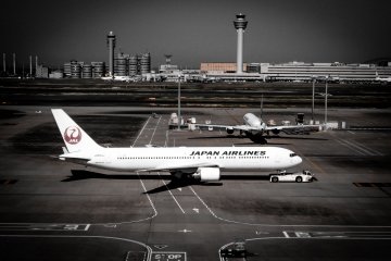 This airplane is slowly making its way out onto the runway in order to take off