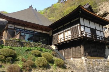 Some buildings are religious, while others have become stores or resting areas for caretakers of the mountain. I noticed a satellite dish on one. That can't be hundreds or years old, can it?
