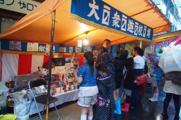 Despite the rain, the children still come out to play! Festivals are not to be missed, that is for sure.