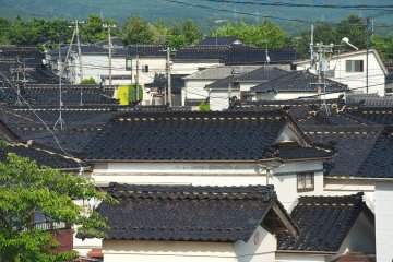 In this area all the houses have black roofs