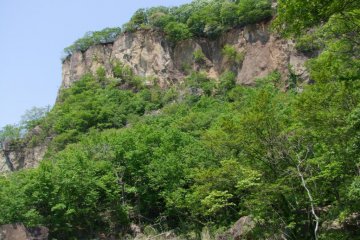 Up there, on the top of this rock cliff, sits this unique Buddhist temple