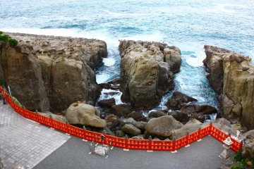 The shrine overlooks some dramatic rocks, constantly buffetted by the waves.