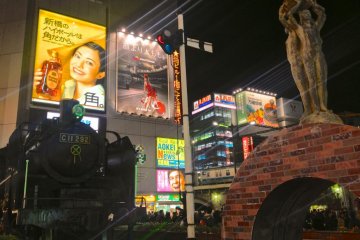 Shimbashi is full of lights and you'll find many people in front of the station on a Friday night