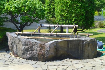 A place for you to rinse your mouth and wash your hands before going in the sacred area