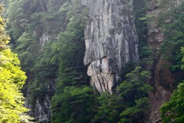 Tateiwa (Shield Rock). The enormity of some of these rock formations are just incredible! To get a better sense of size, find the river boat guide pictured at the bottom.