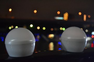Two LED lights before being placed in the water.