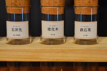 Stones inside of test tubes.