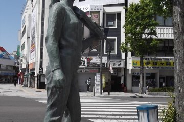 A musician near the station