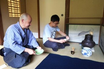 Performing a tea ceremony with guests