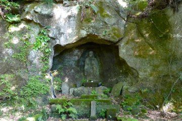 Old stone statues in a cave