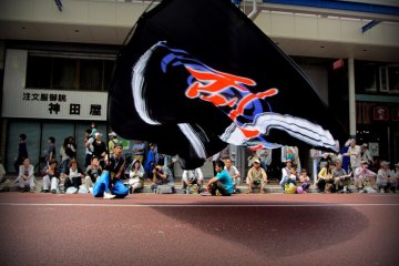 The flags sometimes seem so close to touching the ground, but the dancers always seem to be able to pull them up!