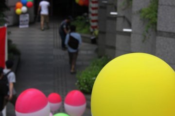 Going down the stairs brings you to the information centre and the gallery section of the Mono-machi Festival.