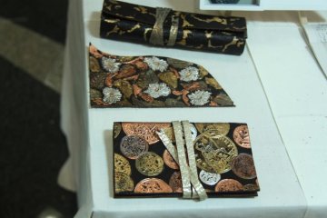 Modern metal embossing techniques for visitors to try out on either a scrap piece of leather or a leather pouch.