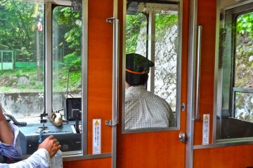 This is one of the switchback points where the train must stop and the Conductor & Driver switch seats since the single track follows a short zig-zag route