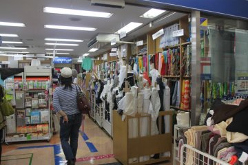 Entrance into the fabric store. Even from the outside, you can see the rows and rows of fabric.
