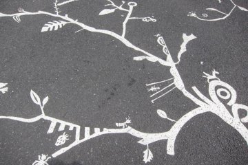 But before you walk in, check out the amazing artworks on the ground
