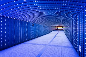 The vivid lights of Tokyo Time Tunnel transform into moving shapes