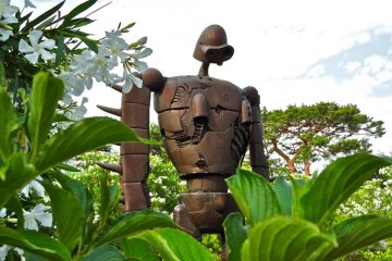 <p>From "Castle in the Sky," a Laputa robot soldier guards the museum from the rooftop which is accessible from an outdoor spiral staircase</p>