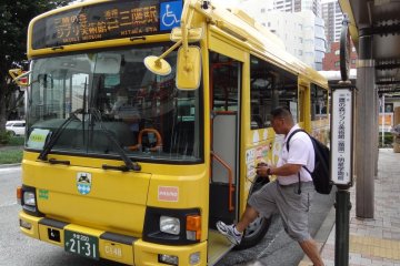 <p>You won't miss the bright yellow community bus just outside the Mitaka train station that offers round-trip fares to and from the Ghibli Museum (&yen;300)</p>