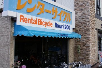 Rent a bike from a kiosk next to Furano Station