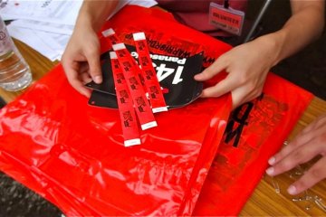 Check-in to receive your running bib and wristband to collect your goody bag at the finish