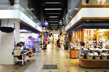 An alleyway of shops. They had a Claire's branch here too.