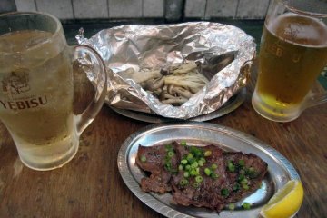 Try new foods like gyūtan (grilled beef tongue) with grilled mushrooms.