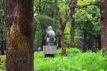 Beautiful and intricate sculptures stand out against the greenery