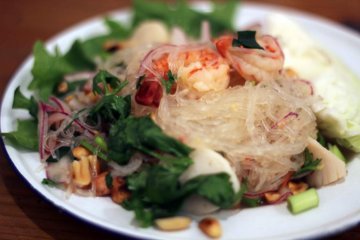 This dish is the glass noodle salad with sticky rice. A lighter dish with lots of flavor.