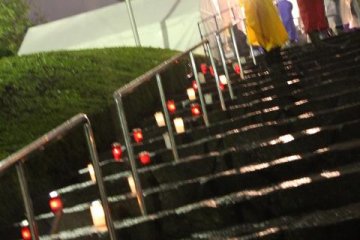 Sparks of fire light up the steps to Zozoji Temple Tokyo