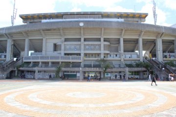 The large apron in front of the stadium is docrated with circular brick patterns mimicing the Okinawan flag