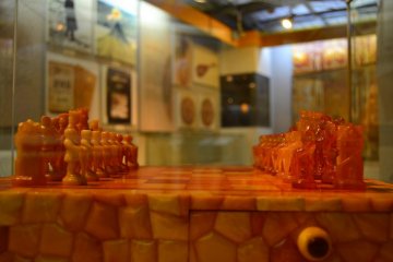 <p>European style amber chess set.</p>