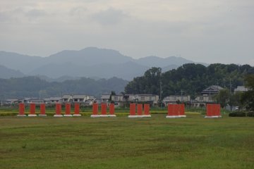 Imagine a majestic palace with mountains as a backdrop