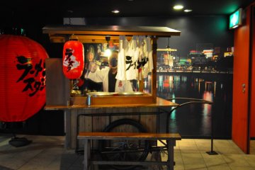 Photo op: a yatai on display at the entrance of the “stadium.’ Fukuoka is famous for these informal food stalls that are set up every night on the streets and serve food such as ramen.