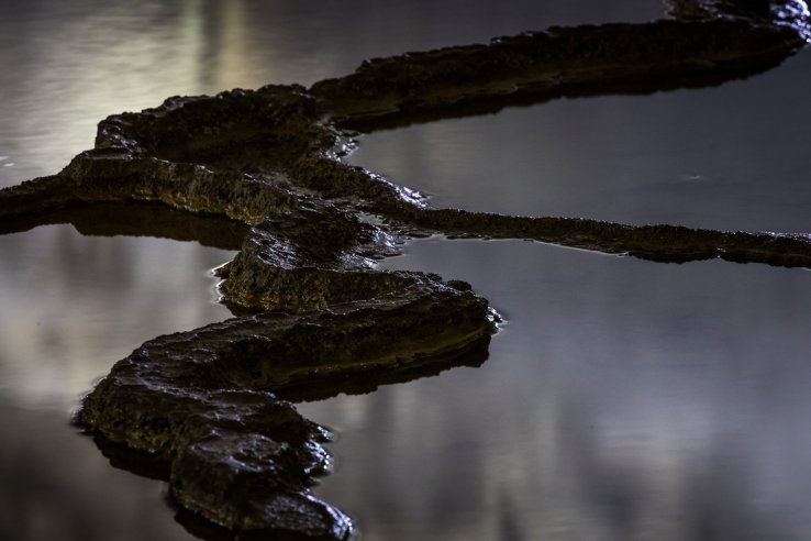 Rimstone dam closeup; these mineral formations echo terraced rice paddies crafted by humans in the world above