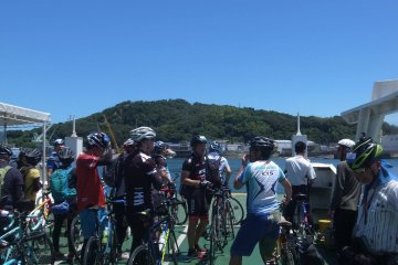 Cyclists crossing to a other islands by ferry