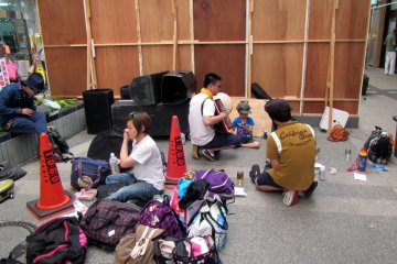 A group of performers preparing for their act