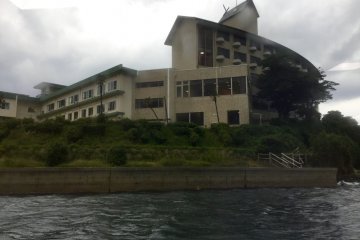 View of the Oki Marine Port Hotel Ama from the water as we pulled into port.