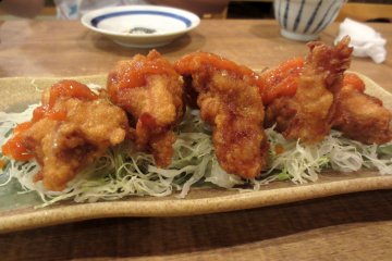 Spicy fried chicken on cabbage - one of the summer specials