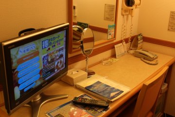 Desk, phone, TV and blowdryer—all the amenities are here.